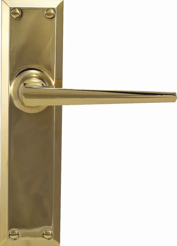 Gold door handle on a white background