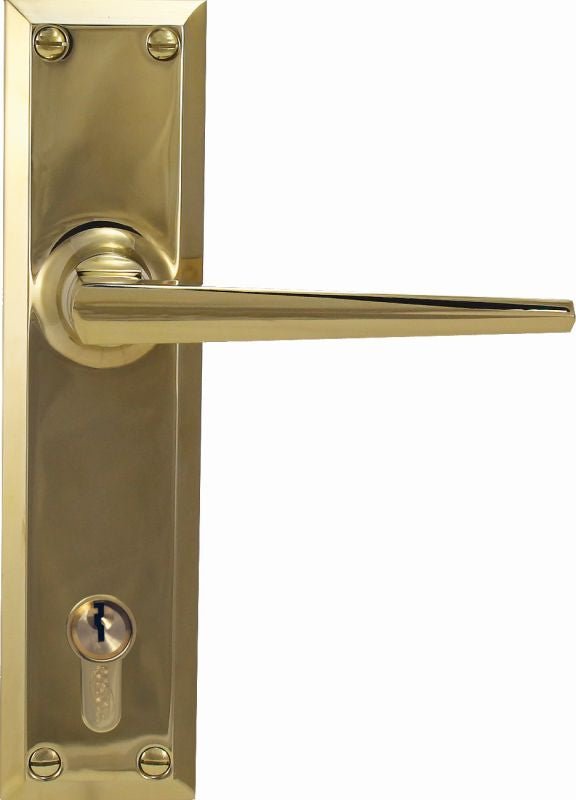 Gold door handle with lock on a white background