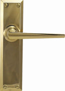 Gold door handle on a white background