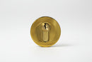 Gold door lock on a white background