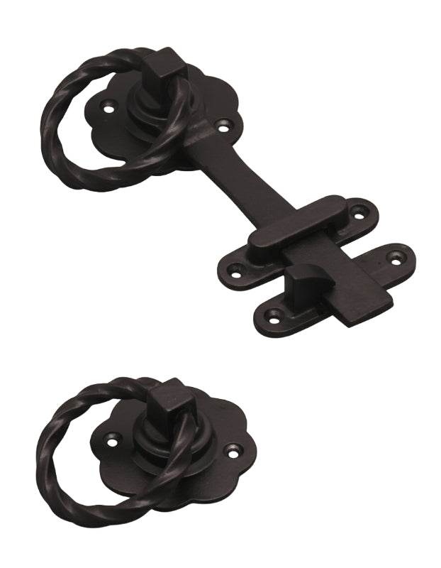 Pair of black metal door latches on a white background