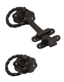 Pair of black metal door latches on a white background
