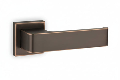 Bronze door handle on a white background