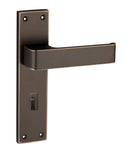 Bronze door handle on a white background