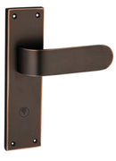 Bronze door handle on a white background
