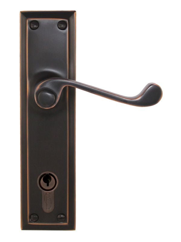 Bronze door handle with lock on a white background