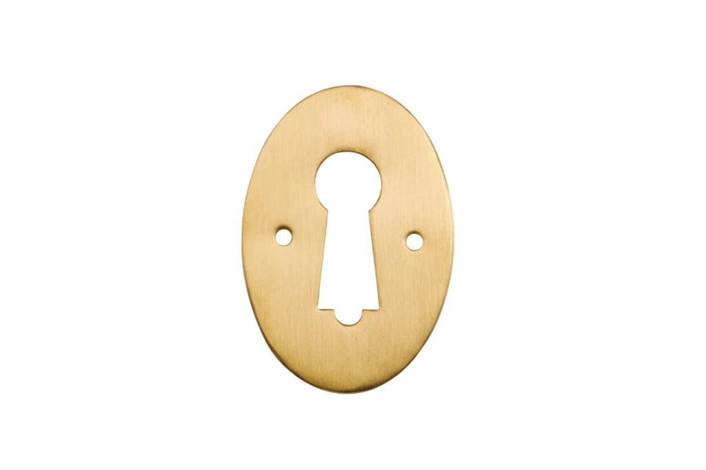 Gold oval keyhole cover on a white background