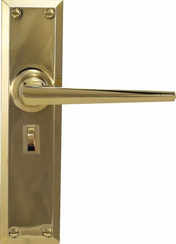 Gold door handle with lock on a white background