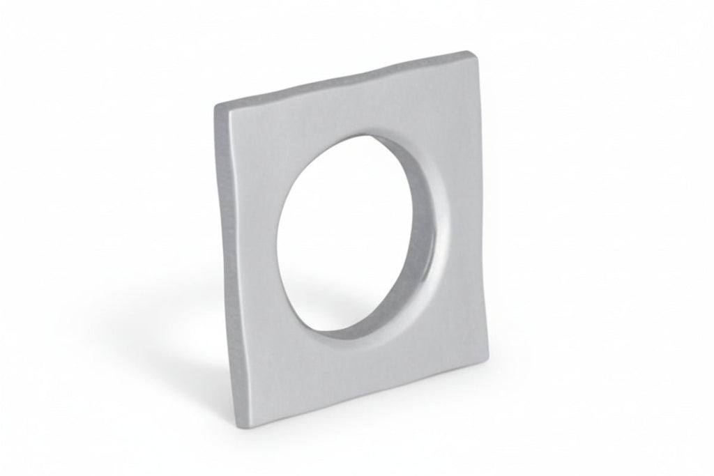 Square light fixture with circular cutout on a white background