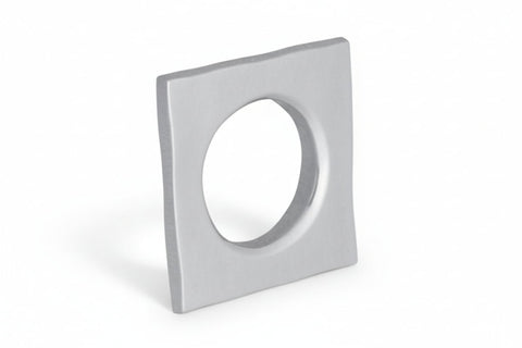 Square light fixture with circular cutout on a white background