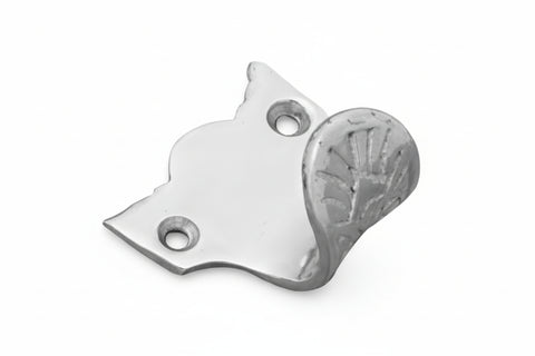 Metallic cat-shaped bottle opener on a white background