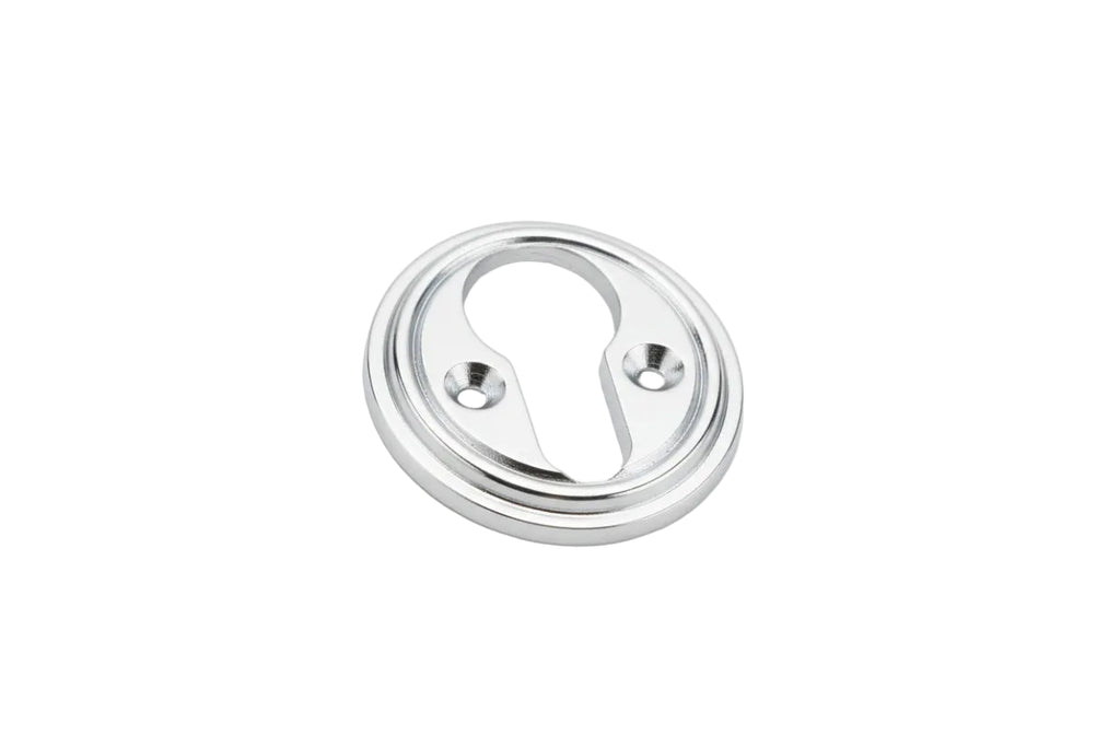 Silver circular object on a white background