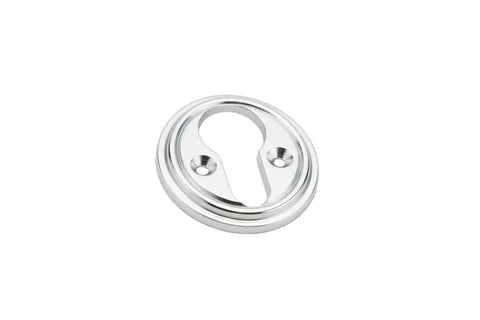 Silver circular object on a white background