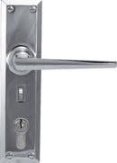 Metal door handle with lock mechanism on a white background