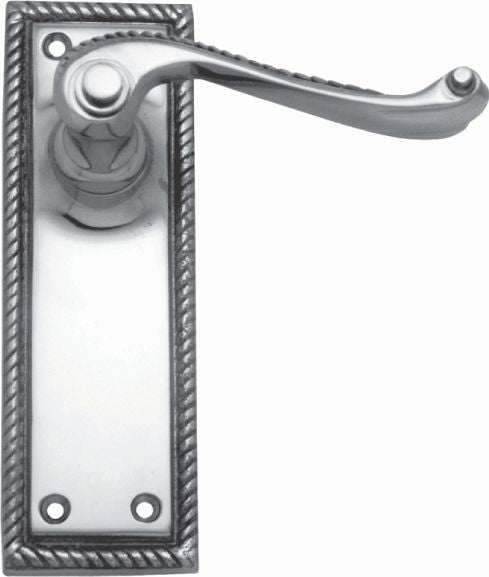 Metal door handle with decorative plate on a white background