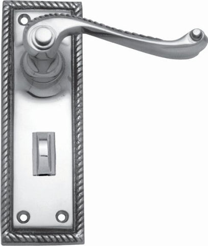 Silver door handle with decorative plate on a white background