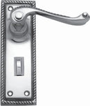 Silver door handle with decorative plate on a white background