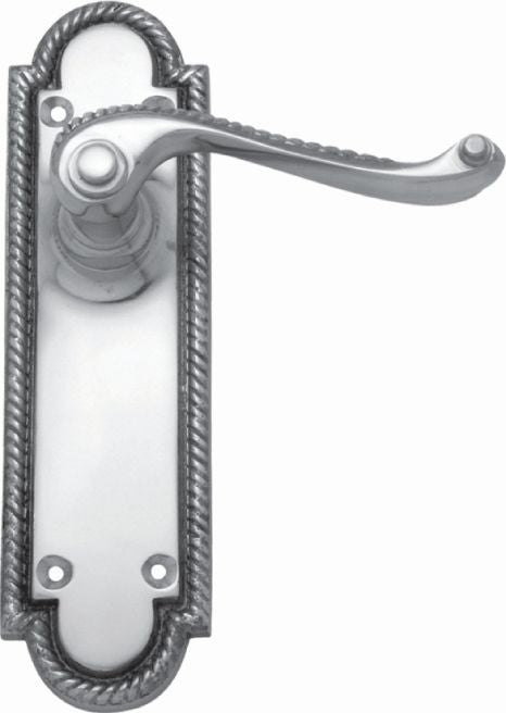 Decorative door handle with metallic finish on a white background