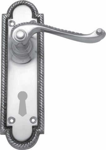 Decorative door handle with intricate design on a white background