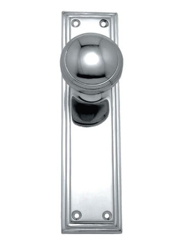 Polished chrome door handle on a white background