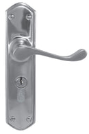 Metal door handle with keyhole on a white background