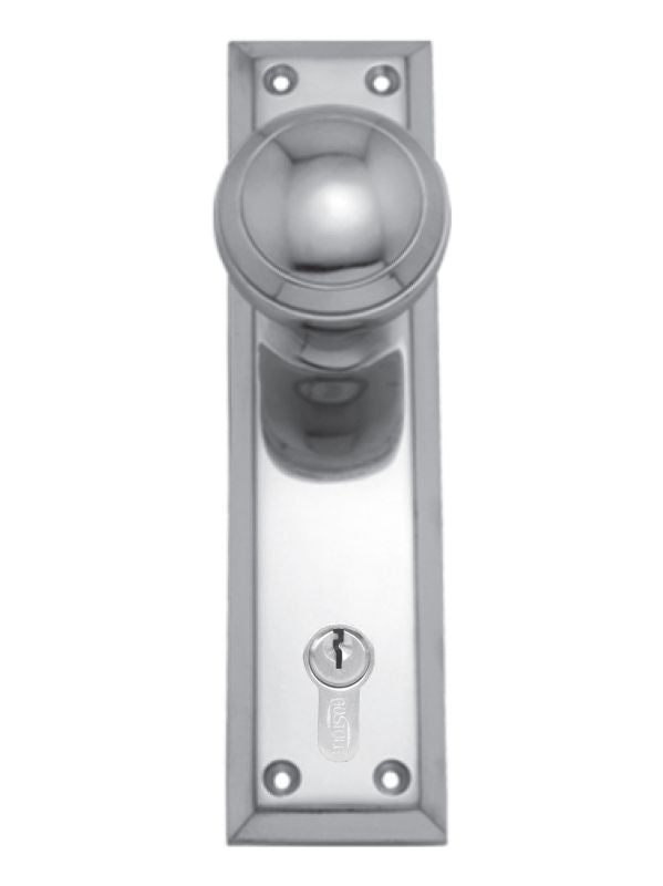 Metal door handle with keyhole on a white background