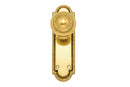 Gold door handle on a white background