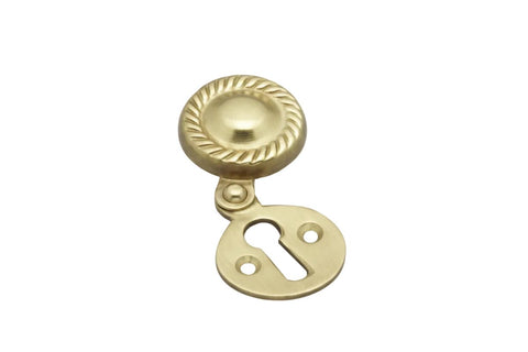 Brass door knob with keyhole on a white background