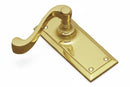 Polished brass door handle on a white background