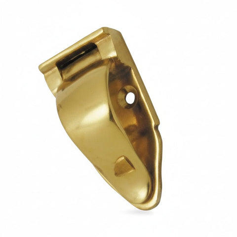 Gold metal clip on a white background