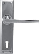 Chrome door handle and lock on a white background