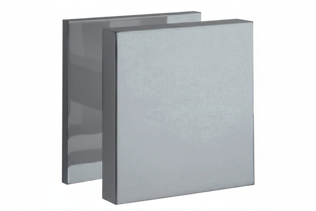 Gray metal filter with a textured surface on a white background