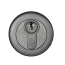Round metallic lock with keyhole on a white background