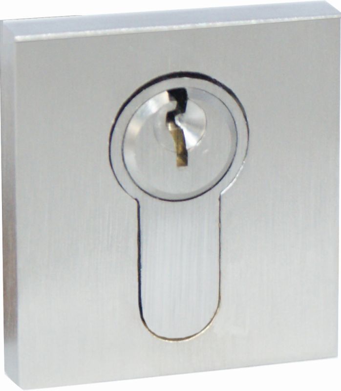 Metallic lock mechanism on a white background