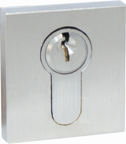 Metallic lock mechanism on a white background