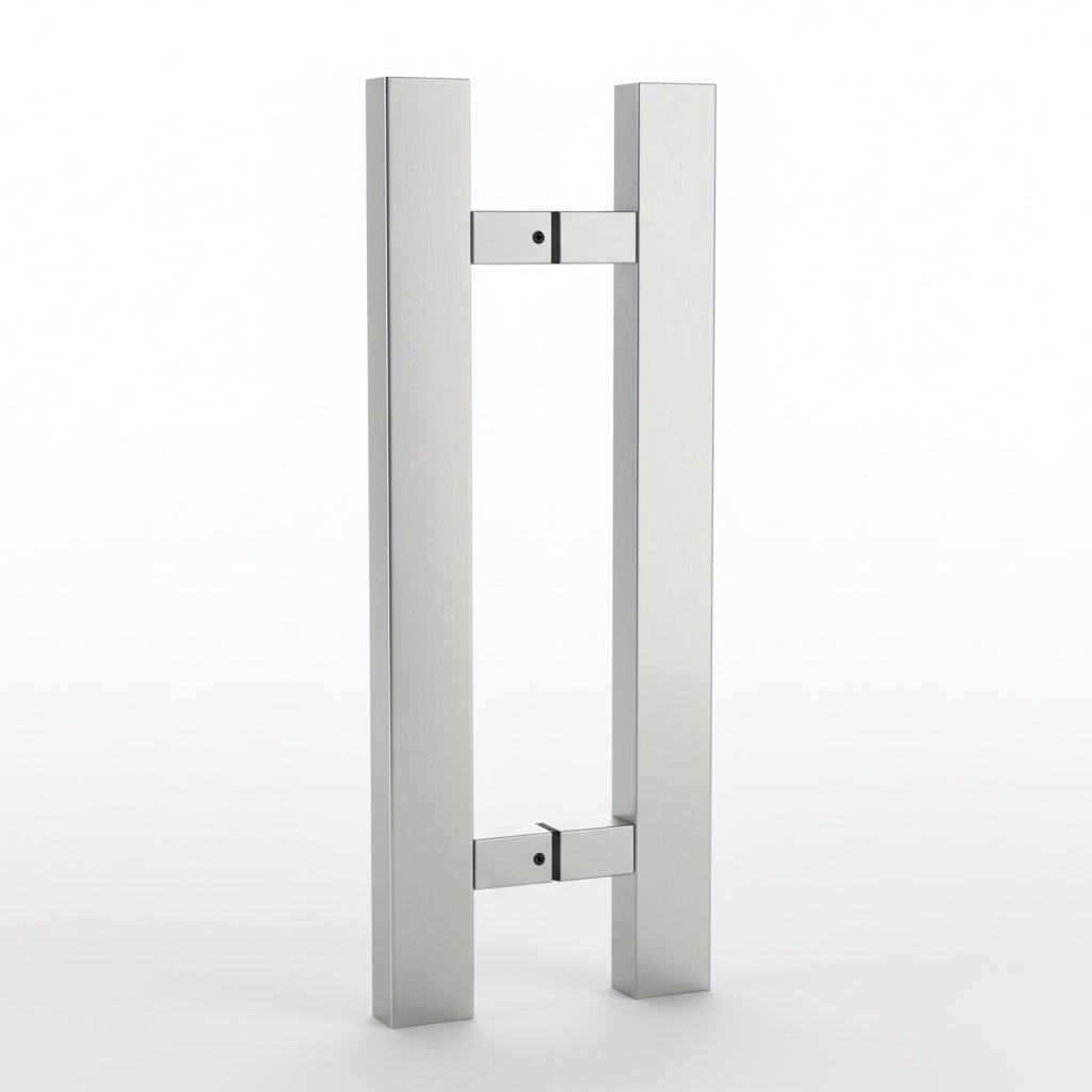 Stainless steel door handle on a dark background