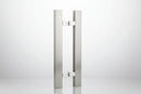 Stainless steel door handle on a dark background