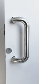 Metal door handle on a white door