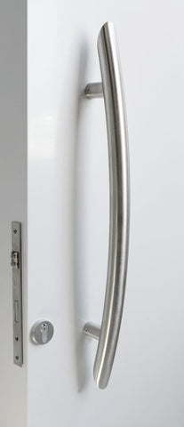 Metal door handle on a white door with a gray frame