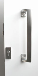 Metal door handle and lock on a white door