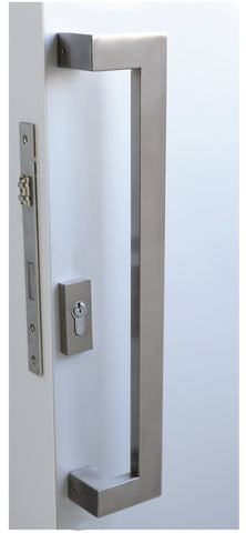 Door handle and lock mechanism on a white door