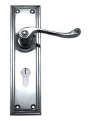 Metal door handle with lock on a white background