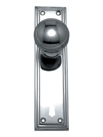 Polished chrome door handle on a white background