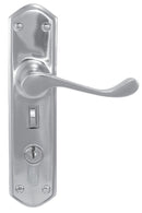 Metal door handle with keyhole on a white background