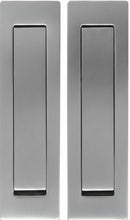 Three rectangular door handles in black, silver, and gold on a white background.