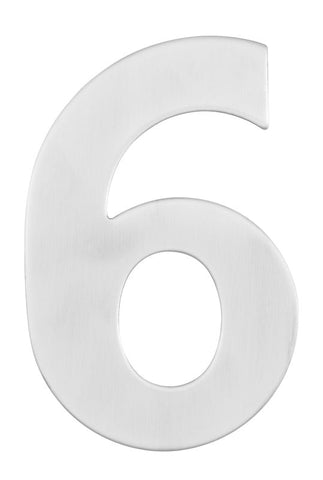 White plastic number '6' on a white background