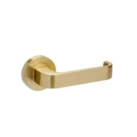 A satin brass Streamline door handle with a leverset on a rose gold finish door.