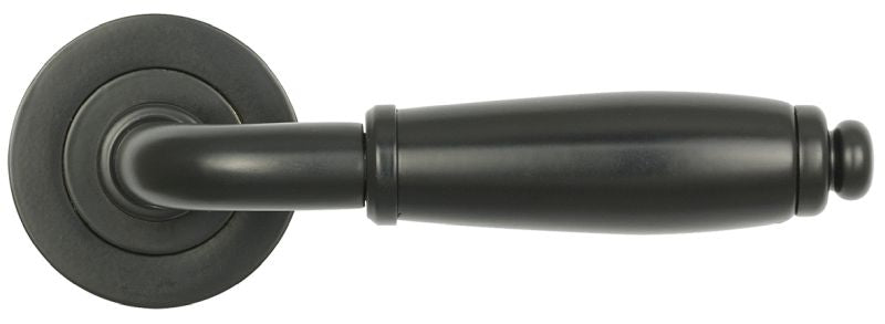 Black door handle on a white background