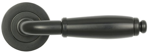 Black door handle on a white background