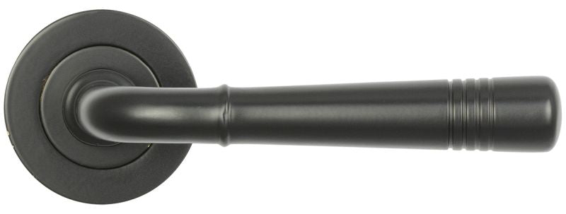 Black door handle on a white background